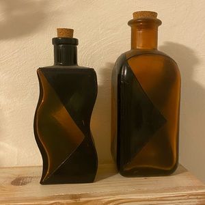 Two amber decorative jars